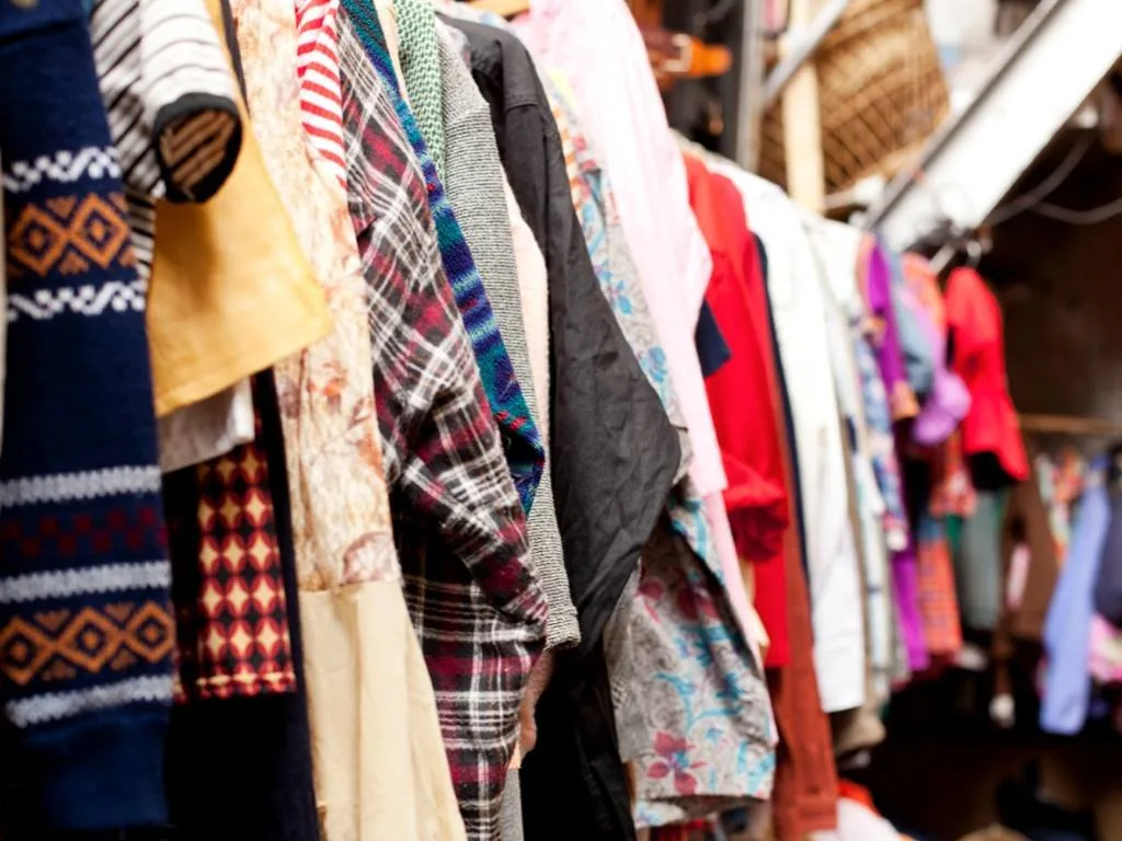 Colourful clothing on rails at MK Storehouse